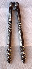 Antique Silver-Plated Nutcrackers With an Intricate Design