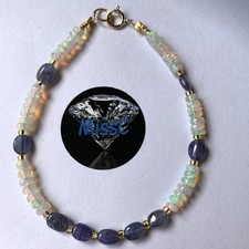 TANZANITE AND FIRE OPAL 9CT