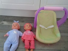 baby doll bundle-car/comfort seat+ 2 baby dolls with outfits on