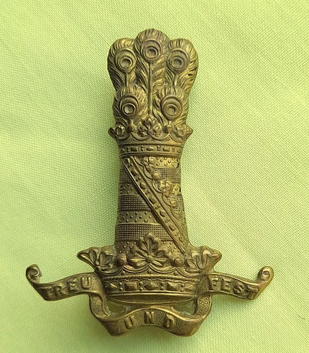 Brass 11th hussars cap badge - brass,