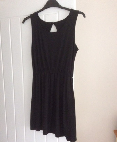 Sleeveless black summer dress