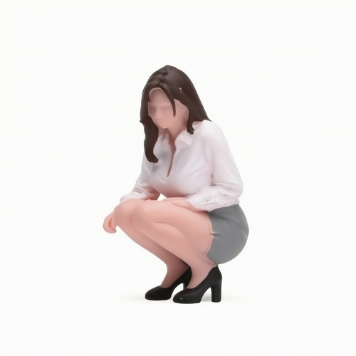 Crouching woman figurine - crouching,