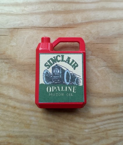 Sinclair metal oil can suit - can,