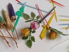 Vintage cocktail sticks parasol swords roses golfer Donald Duck. Home bar, shed.