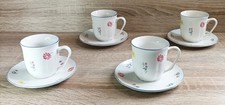 Set Of Four Floral Tea Cups And Saucers