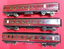 3 X Exley O Gauge LMS Metal Coaches numbers 6668, 1112, 8444. Sprung wheels.