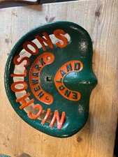 old cast iron tractor seat