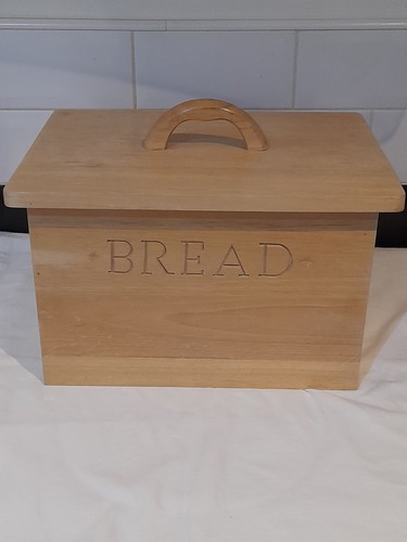 Wooden bread bin with - bread,