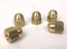 High crown brass acorn nuts - high,
