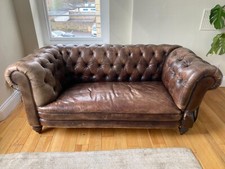 Sofa leather chesterfield drop arm , antique circa 1890. Stunning rare example.