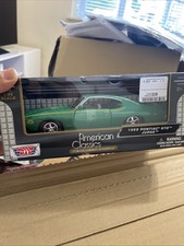 Pontiac GTO Judge (1969) - Motormax 1:24 - MX73242GR