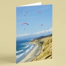 Paragliding above coastline