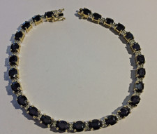 9CT GOLD 3.90CT SAPPHIRE & 0.52 CT DIAMOND LADIES TENNIS BRACELET,  11.72 GRAMS,