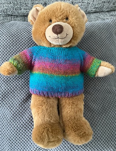 Hand knitted teddy bear - hand,