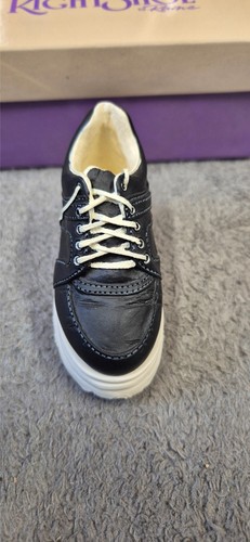 Just the right shoe sneaking - right,