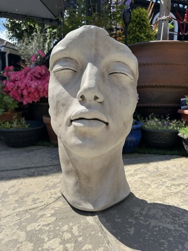 Abstract female face sculpture - female,