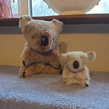 large mum small baby fur kola