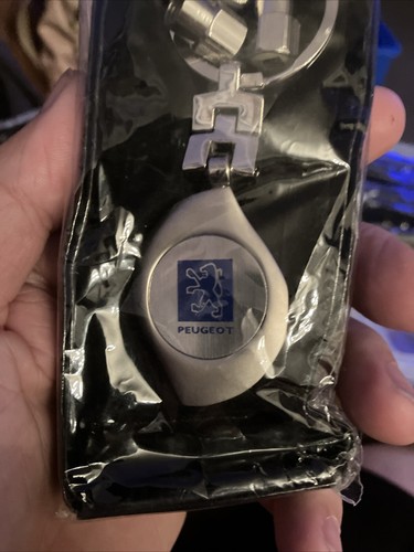 Peugeot key ring with - peugeot.,