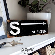 S SHELTER Arrow Metal Sign Man