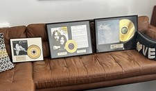 * Gorgeous Collection of Framed John Lennon / Plastic Ono Band Gold Discs *