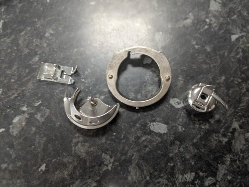 Bobbin case holder - bobbin,