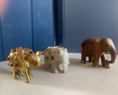 Three hand carved elephant - carved,