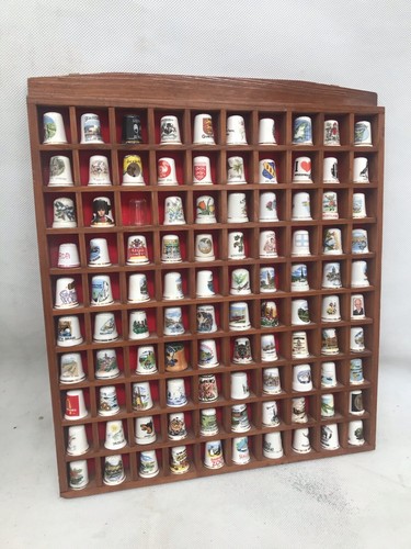 Thimble display case with - thimble,