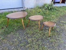 A Set of Ercol Pebble Tables /