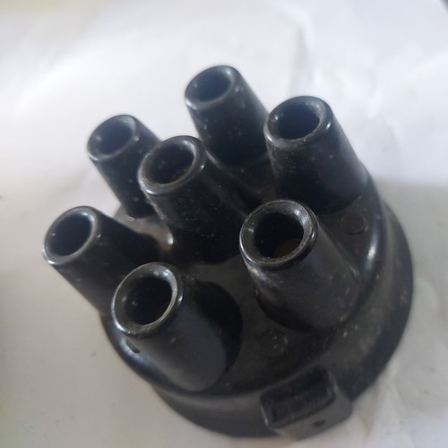 Distributor cap for - ,