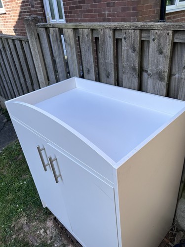 White dresser with - a,