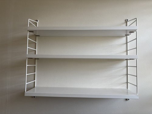 White wall shelving unit - wall,