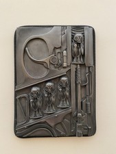 Giger inspired bullet babies wall plaque resin cast 