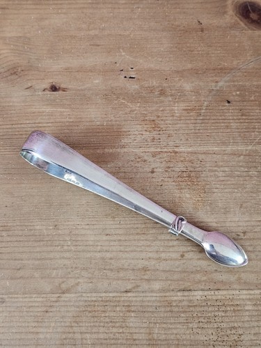 Solid silver sugar tongs - solid,