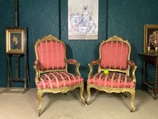 A FINE PAIR OF ANTIQUE FRENCH GILT CHATEAU PARLOUR ARMCHAIRS