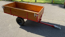 Wood sided tipping farm trailer