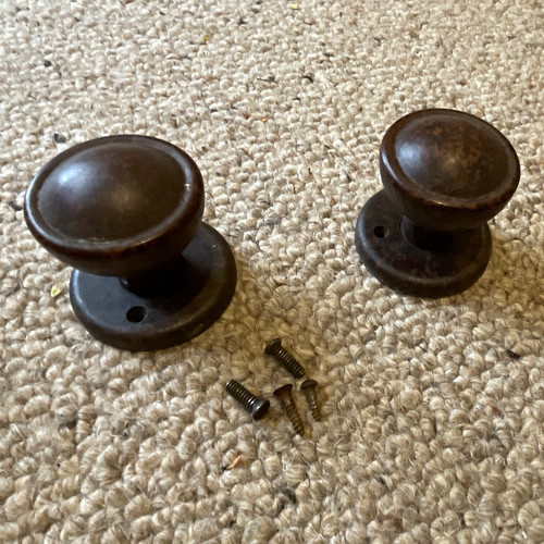 Pair round brown bakelite door - pair,