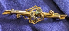 Antique Edwardian real peridot brooch. Gold tone.