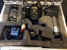 Canon T90 SLR camera with lens, flash in case not tested, but in good condition