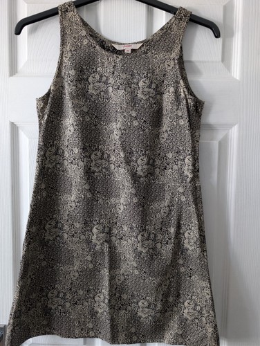 Black and beige sleeveless - and,
