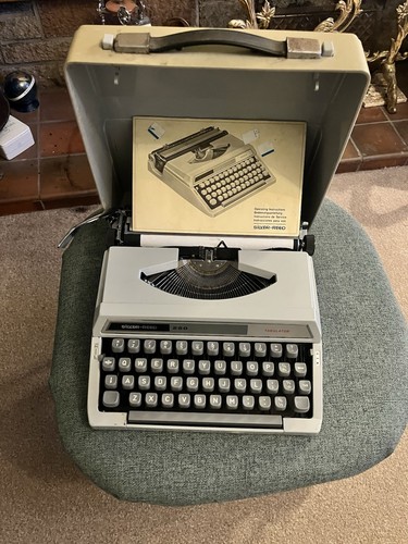 Vintage typewriter with carry - with,