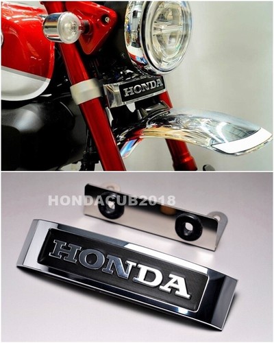 Front fork emblem - front,