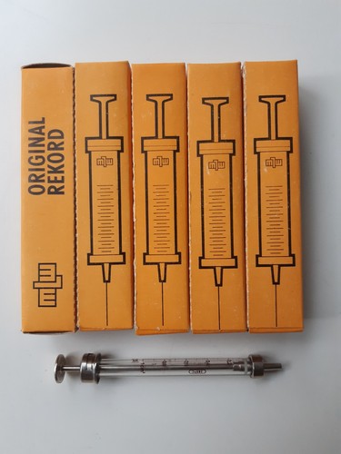 Five vintage glass syringes - five,
