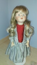 Reproduction porcelain doll - reproduction,