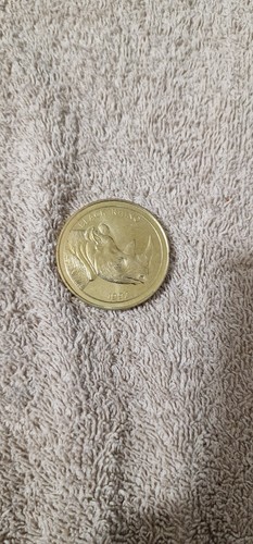 World savers coins - x4, rhino