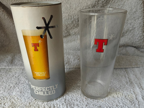 Tennents pint glass with - pint,