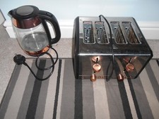 Rose gold silver matching toaster roll holder and kettle by Tower used .