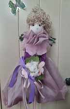 A hanging interior doll