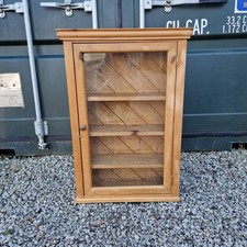 1 Glazed Pine Storage Cupboard