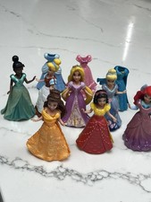 7 x Magic Clip Dolls Disney
