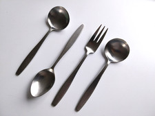 FOUR VINTAGE STAINLESS STEEL